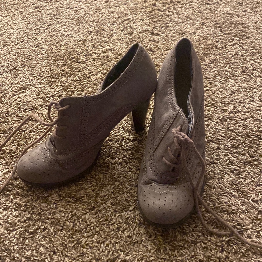 Gray lace booties. In new like condition. Only worn a couple times